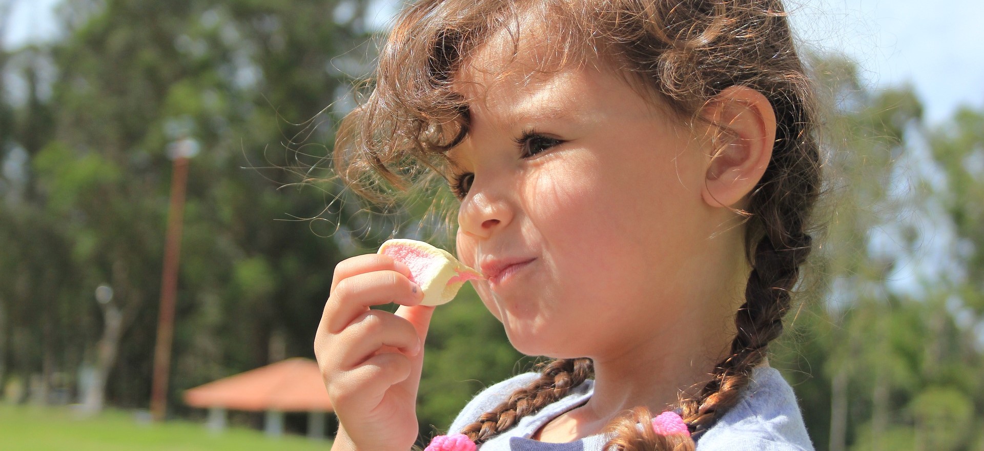 Little Girl Eating Marshmallow | Kids Car Donations