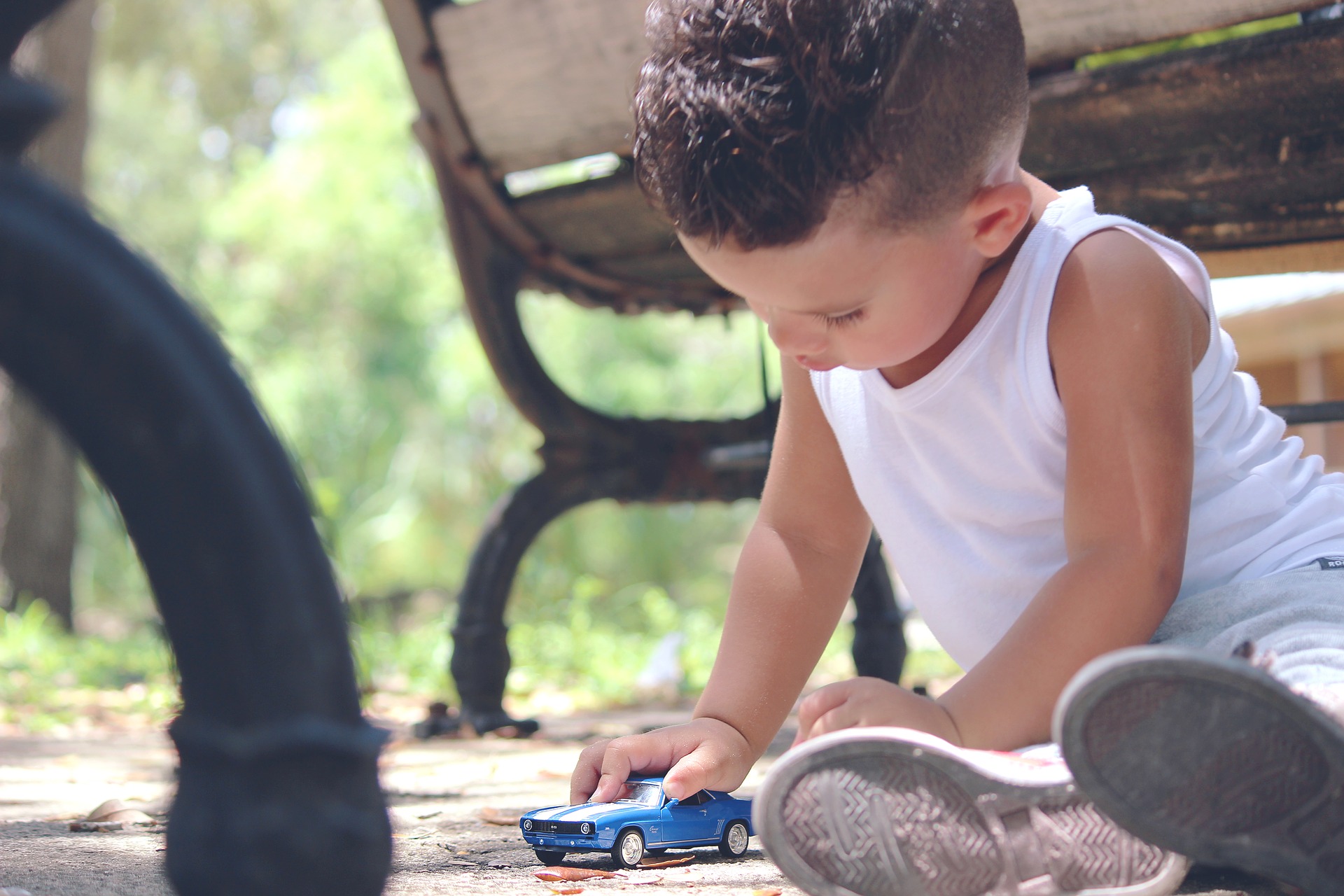 Little Kid Playing with a Toy Car | Kids Car Donations