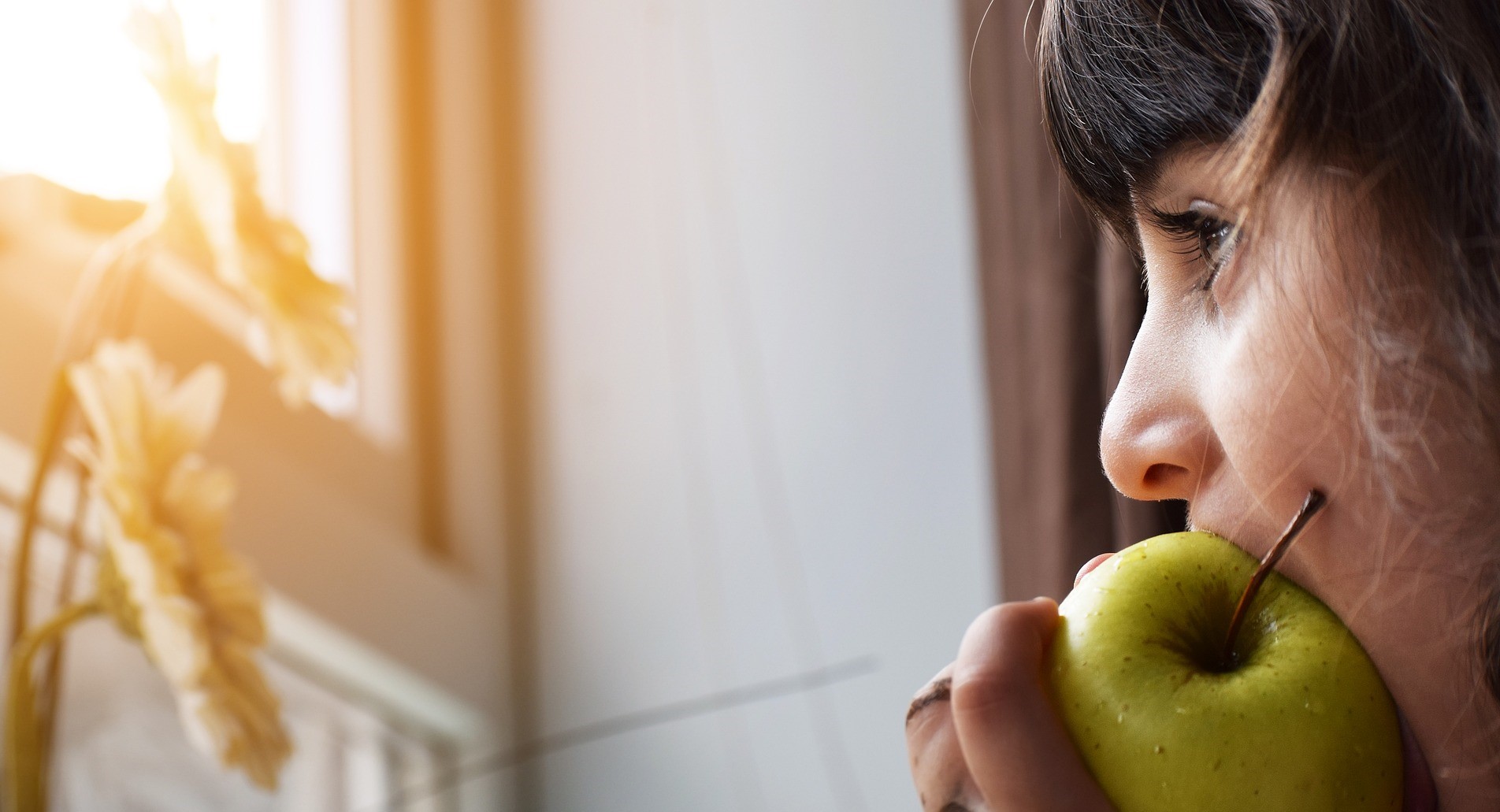Kid Eating Apple | Kids Car Donations