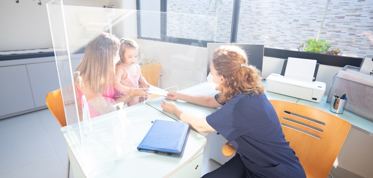 Physician Examining Her Patient | Kids Car Donations