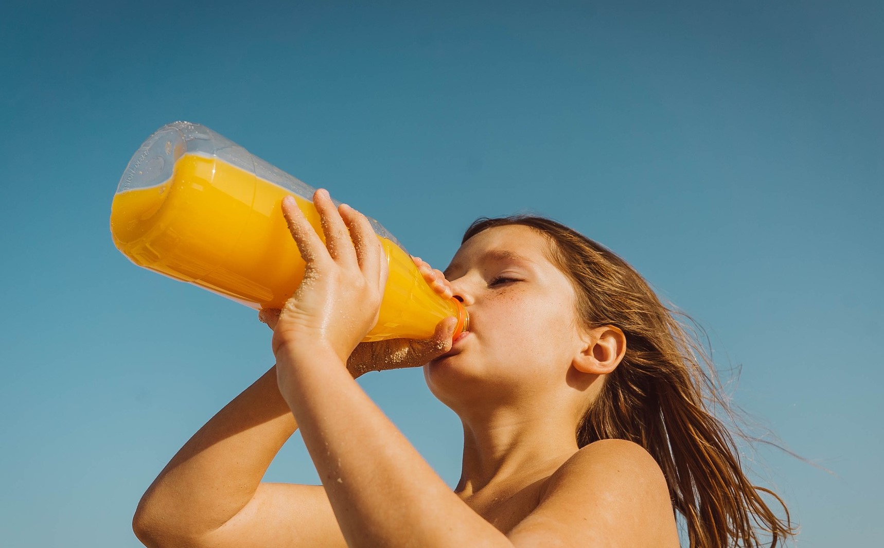 Kid Drinking Orange Juice | Kids Car Donations