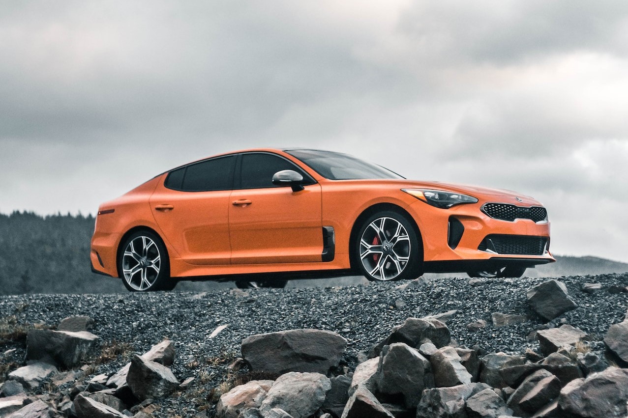 Kia Stinger in Orange Color | Kids Car Donations