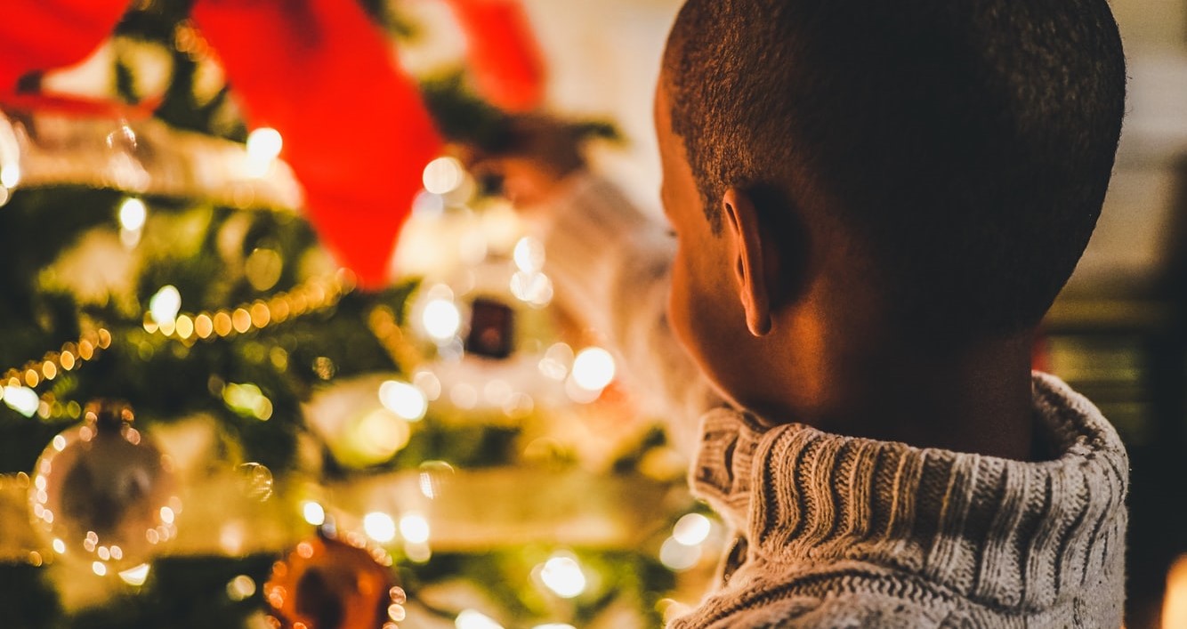 Kid Enjoying the Christmas Tree | Kids Car Donations
