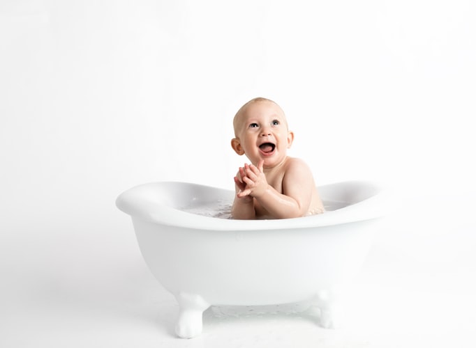Baby Having Fun at Bath | Kids Car Donations