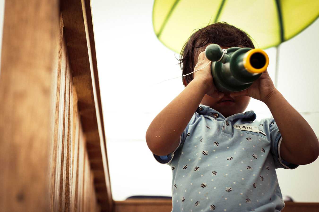 Toddler Using Monoscope | Kids Car Donations