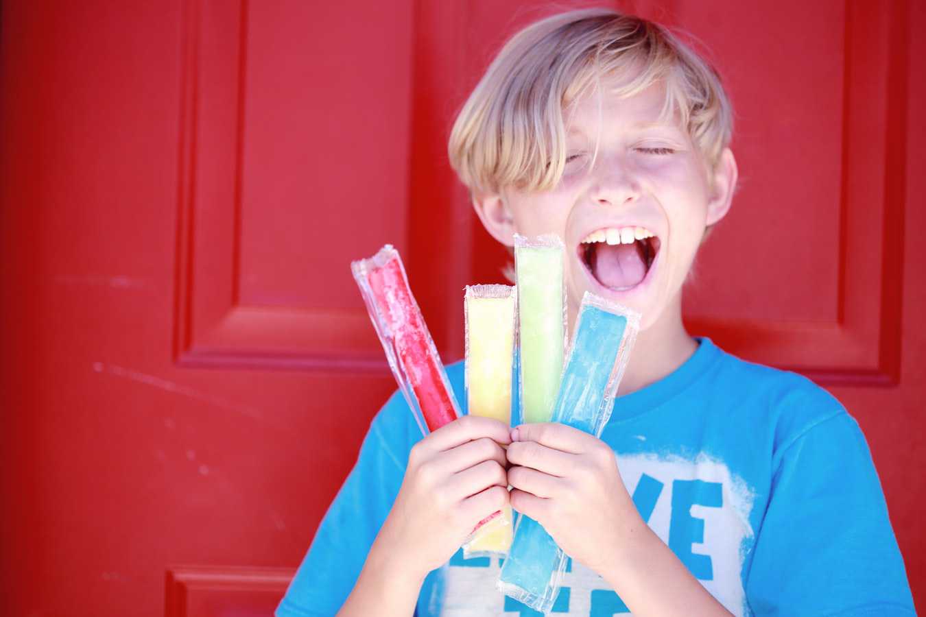 Kid Enjoying Popsicles | Kids Car Donations