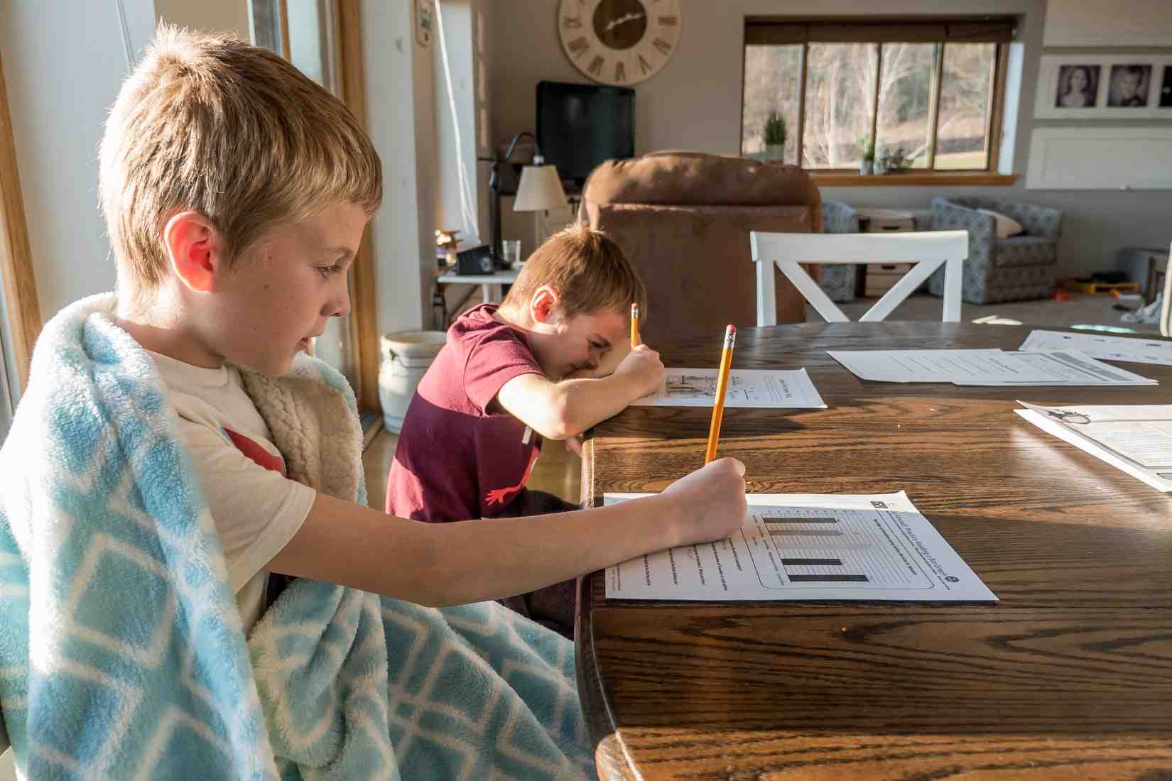 kid doing homework at home