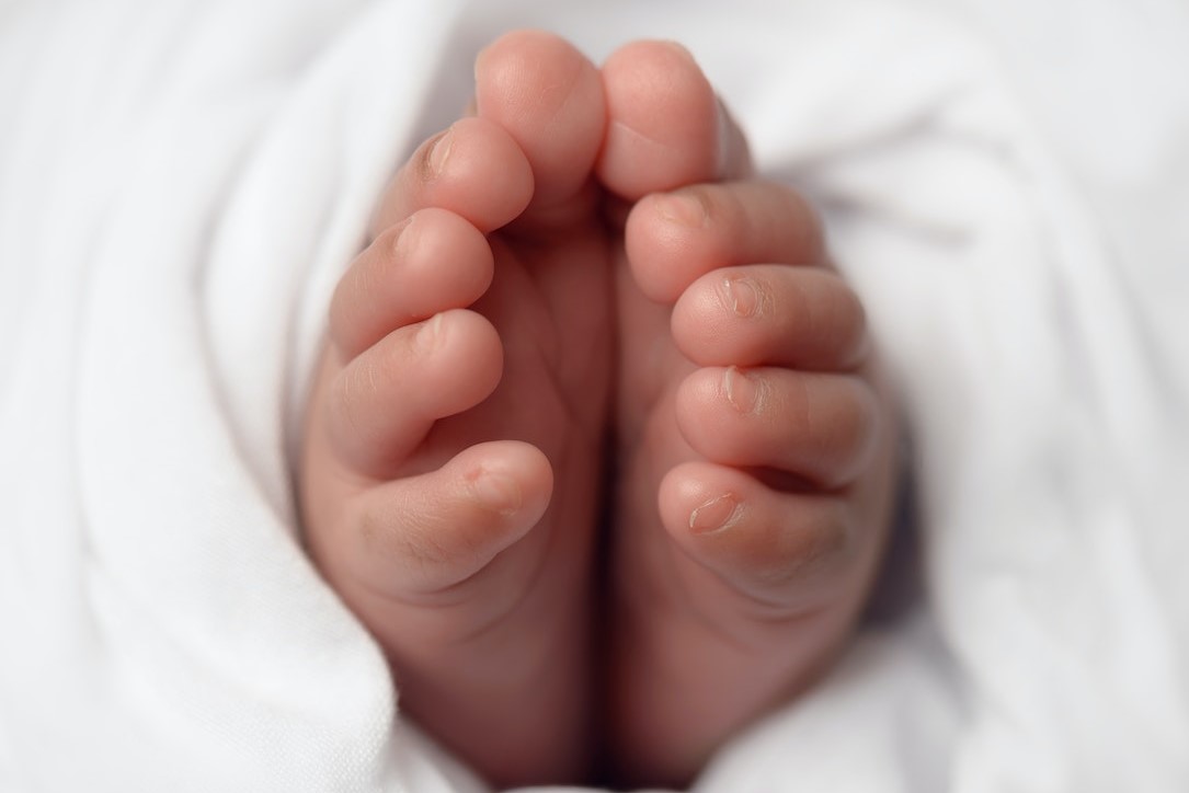 Babies Feet Selective Focus Photo | Kids Car Donations