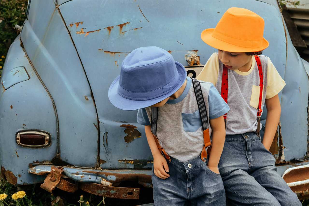 Kids Sitting on a Car | Kids Car Donations