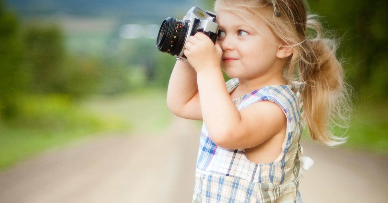Little Kid Taking Photo | Kids Car Donations