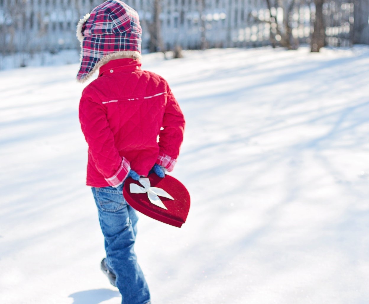 Kid Playing in Snow this Winter | Kids Car Donations