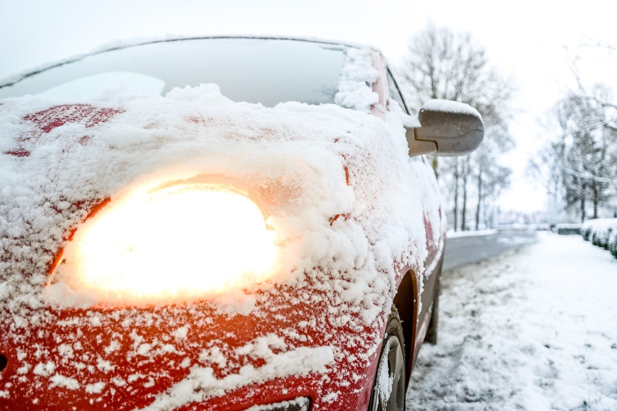 Snow Covered Red Sedan | Kids Car Donations