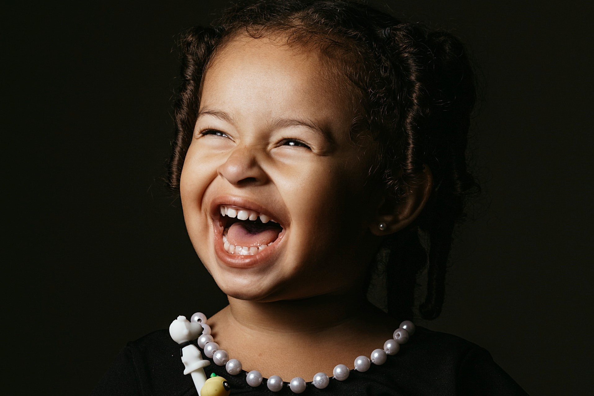 Girl Wearing Black Smiling | Kids Car Donations