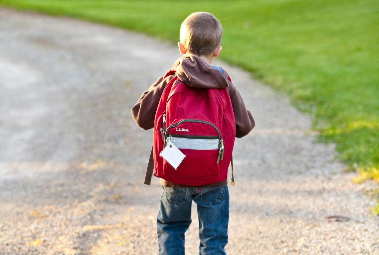 Kid Wearing Red Backpack on Back to School | Kids Car Donations