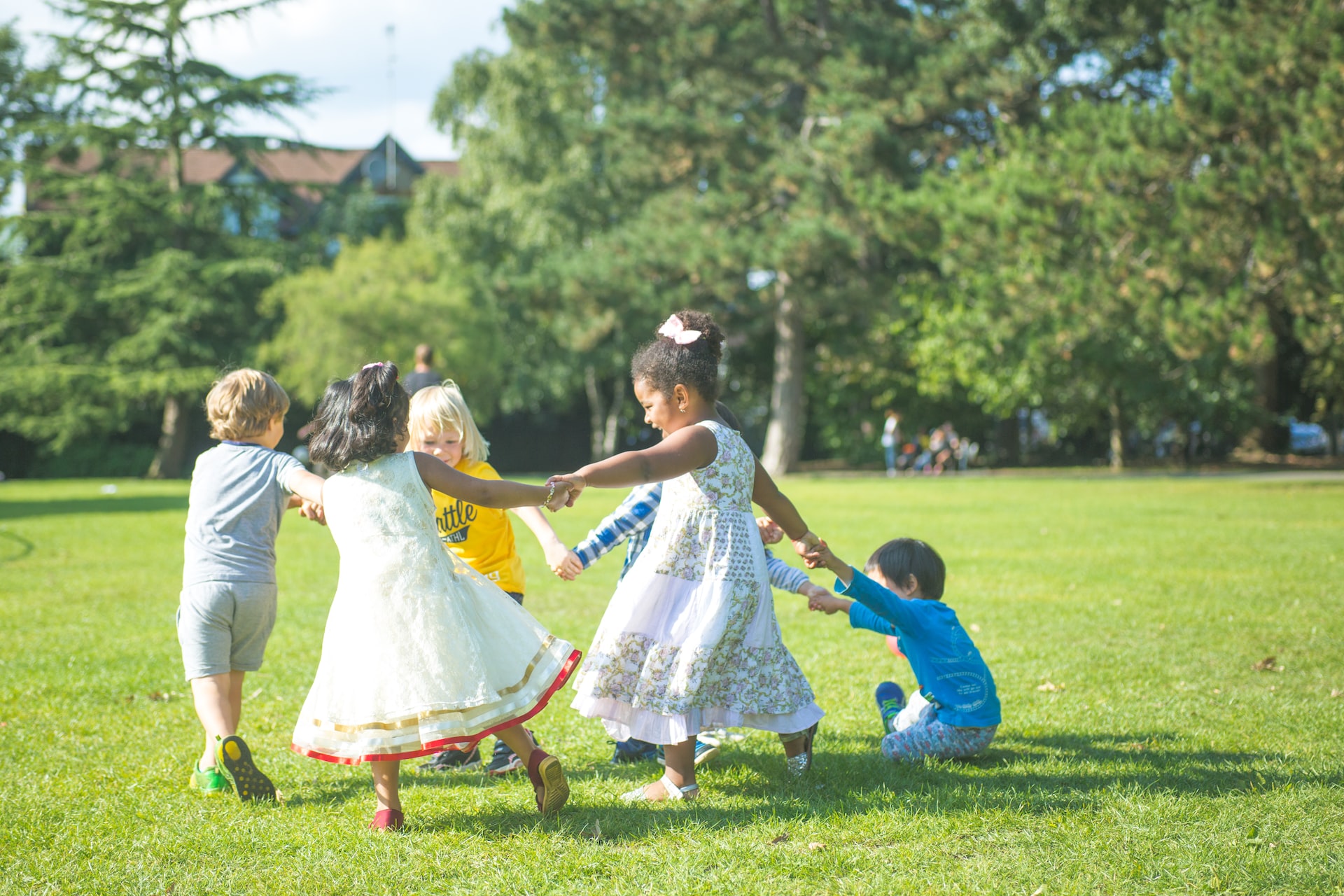 Children Playing in the Green Grass | Kids Car Donations