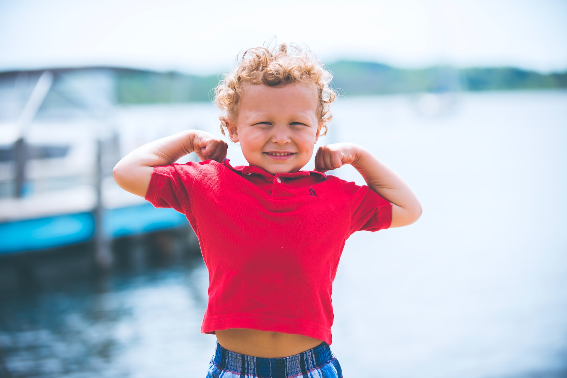 Boy Standing Near Dock | Kids Car Donations