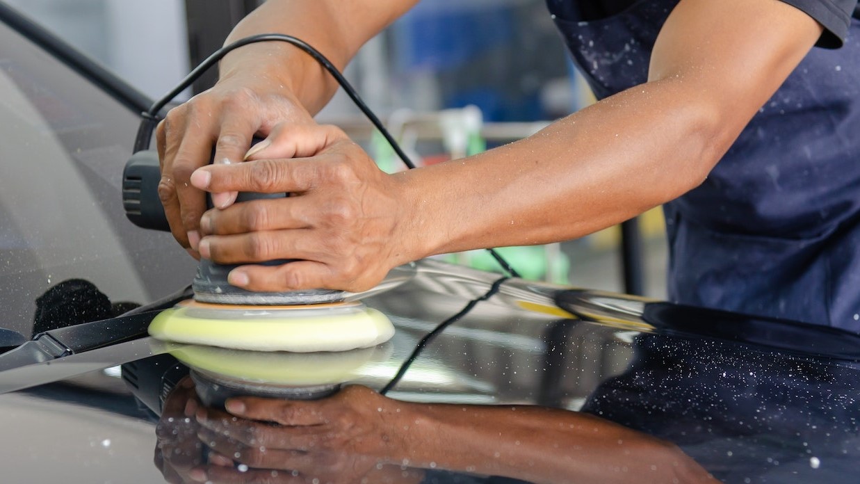 A Person Buffing a Car | Goodwill Car Donations