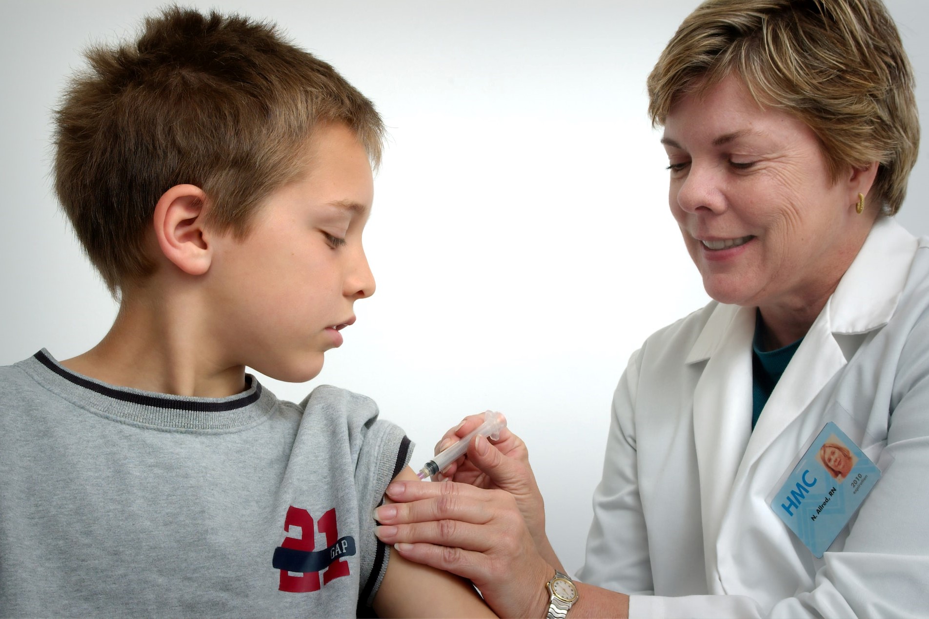 The nurse depicted in this 2006 photograph was in the process of administering an intramuscular vaccination in the left shoulder of a young boy | Kids Car Donations