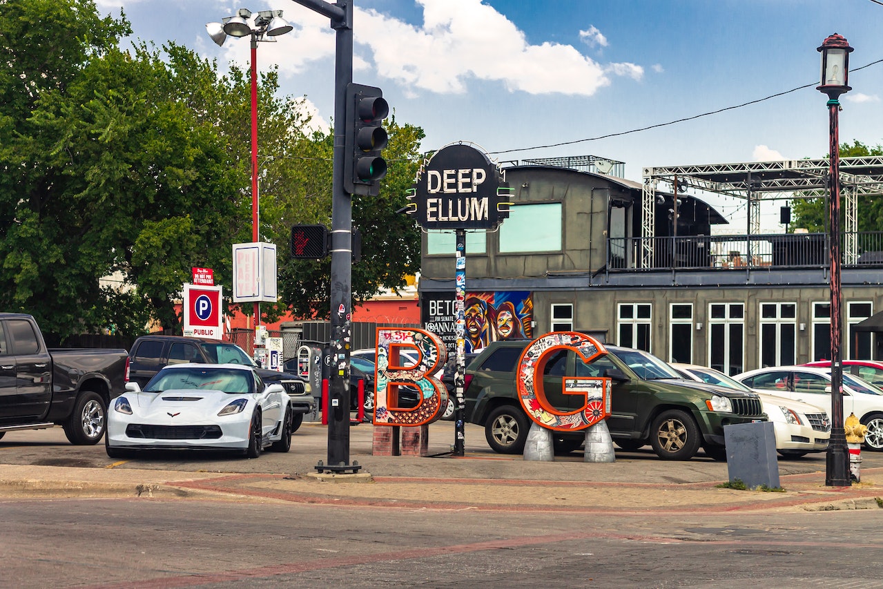 Cars in a Parking Lot at Deep Ellum in Dallas | Kids Car Donations