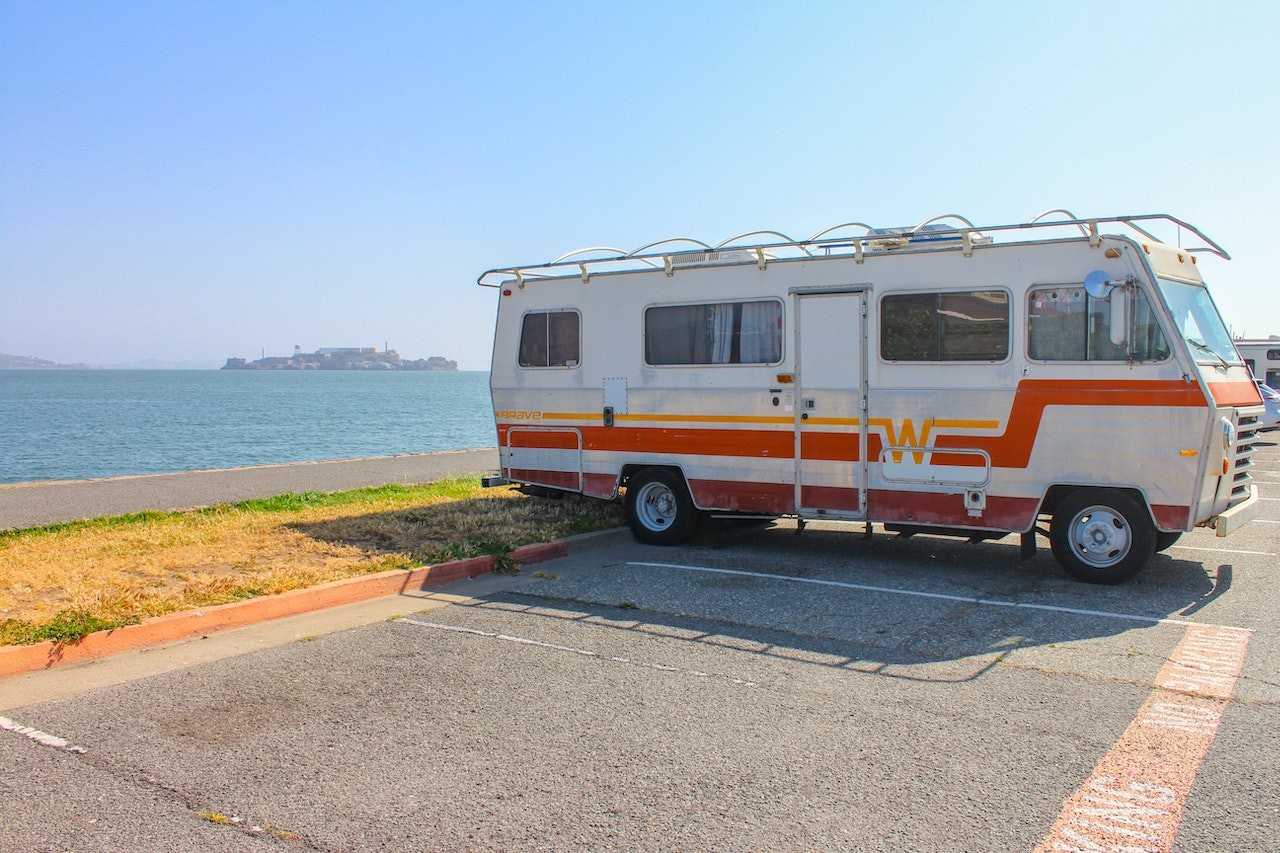 Trailer Van parked alongside Ocean | Kids Car Donations