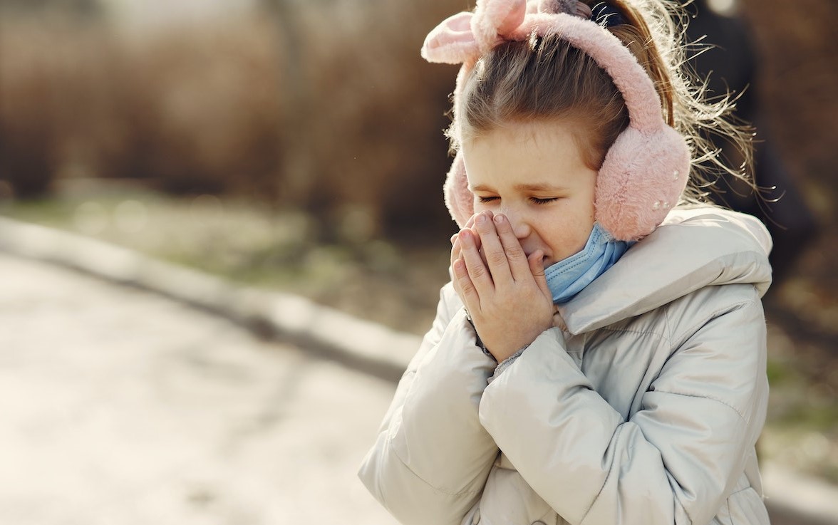 Shallow Focus Photo of a Girl Sneezing | Kids Car Donations