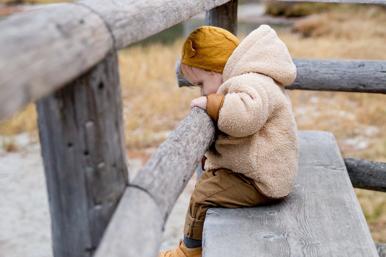 Photo Of Baby Leaning On Wooden Fence | Kids Car Donations
