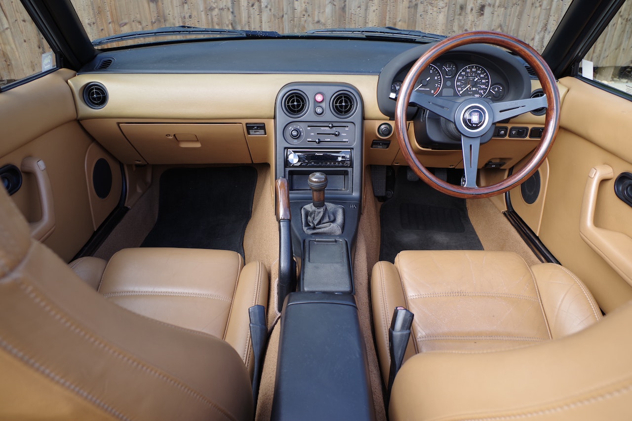 Photo of a Black and Brown Car Interior | Kids Car Donations