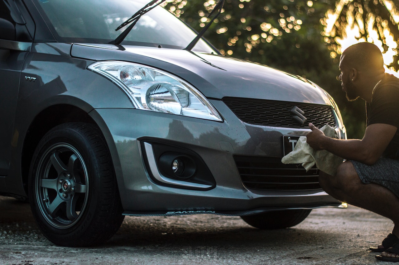 Photo of Man Cleaning His Car | Kids Car Donations