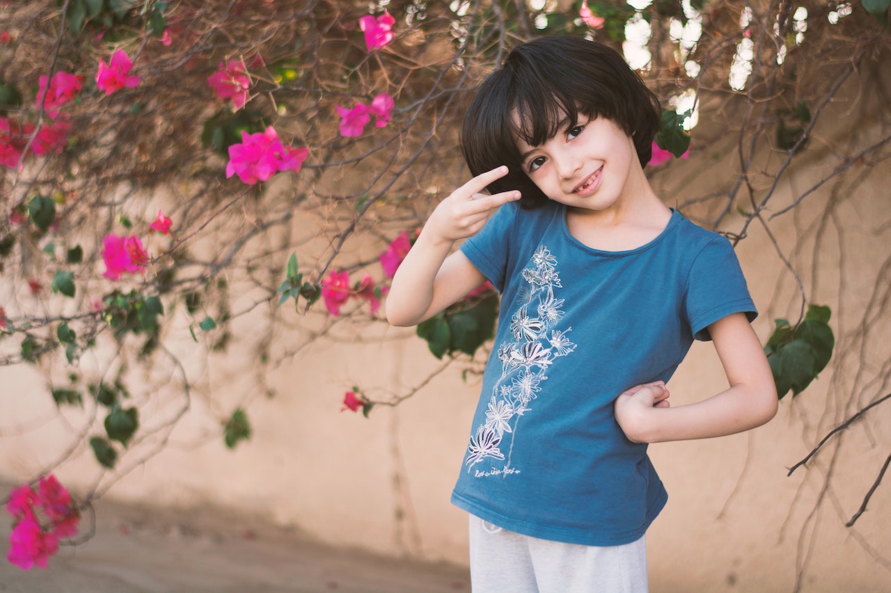 Girl In Blue Crew-neck T-shirt | Kids Car Donations