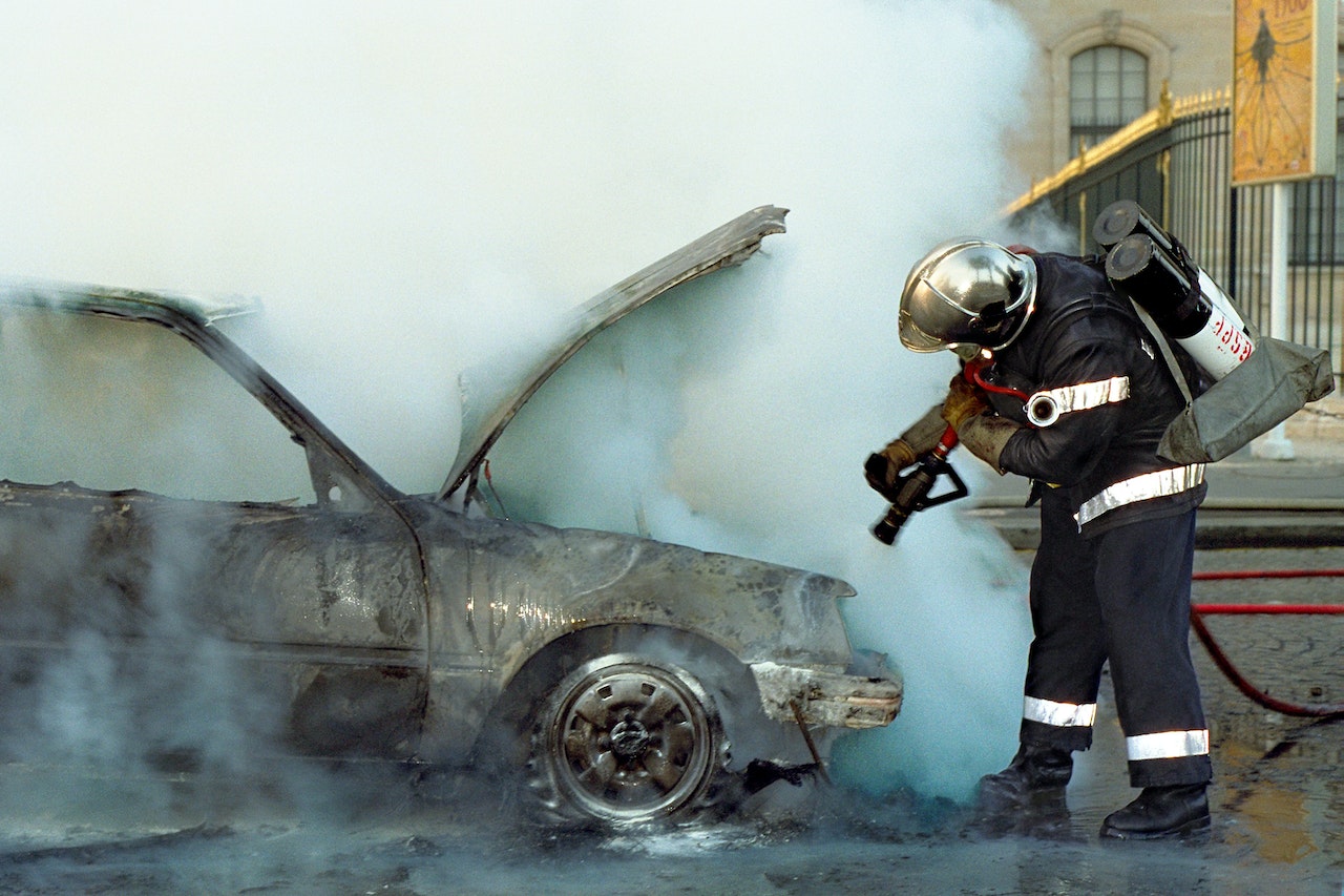 Firefighter Extinguishing a Broken Car | Kids Car Donations