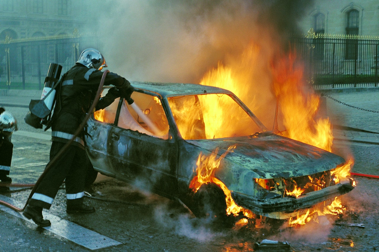 Firefighter Extinguishing a Burning Car | Kids Car Donations
