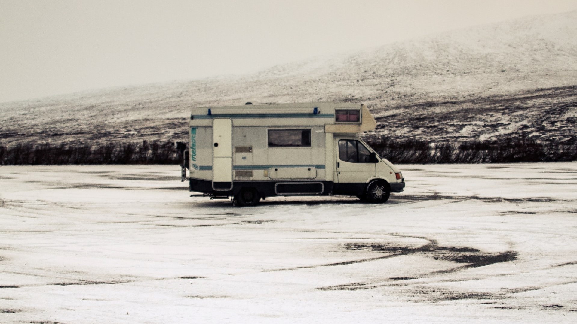 White rv on a snowy field | Kids Car Donations