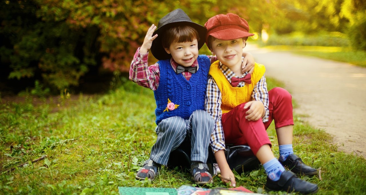 Boys Sitting On Grass | Kids Car Donations