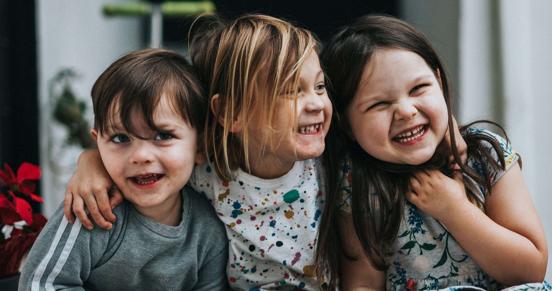Three kids laughing | Kids Car Donations