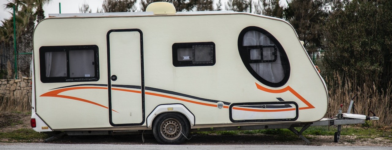 White with orange lining travel trailer | Kids Car Donations