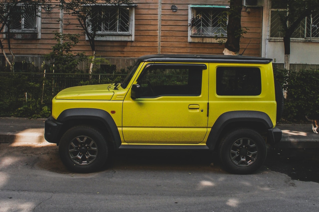 Yellow Jeep parked | Kids Car Donations