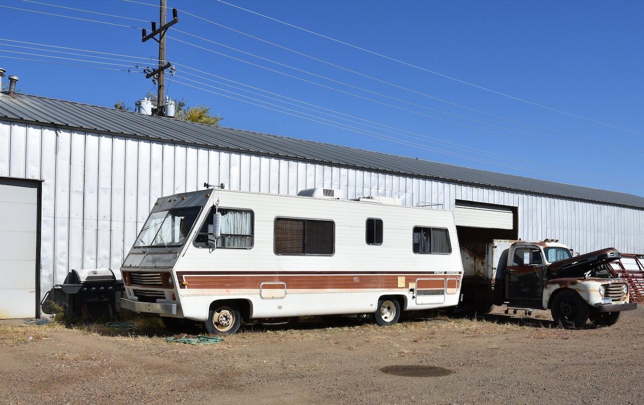 Mobile RV Parked on Dirt Road | Kids Car Donations