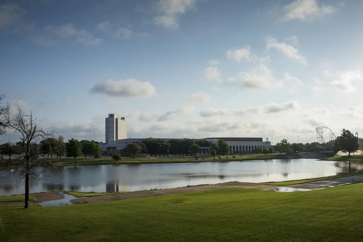 Green grass field near a body of water during daytime in Virginia TX