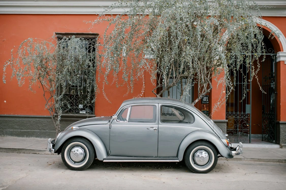 Silver Volkswagen Beetle parked in Lima, Peru