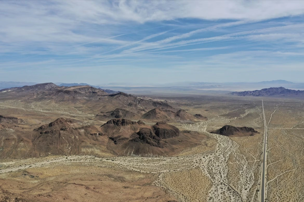 Aerial photo of mountains and desert road in San Bernardino County, California