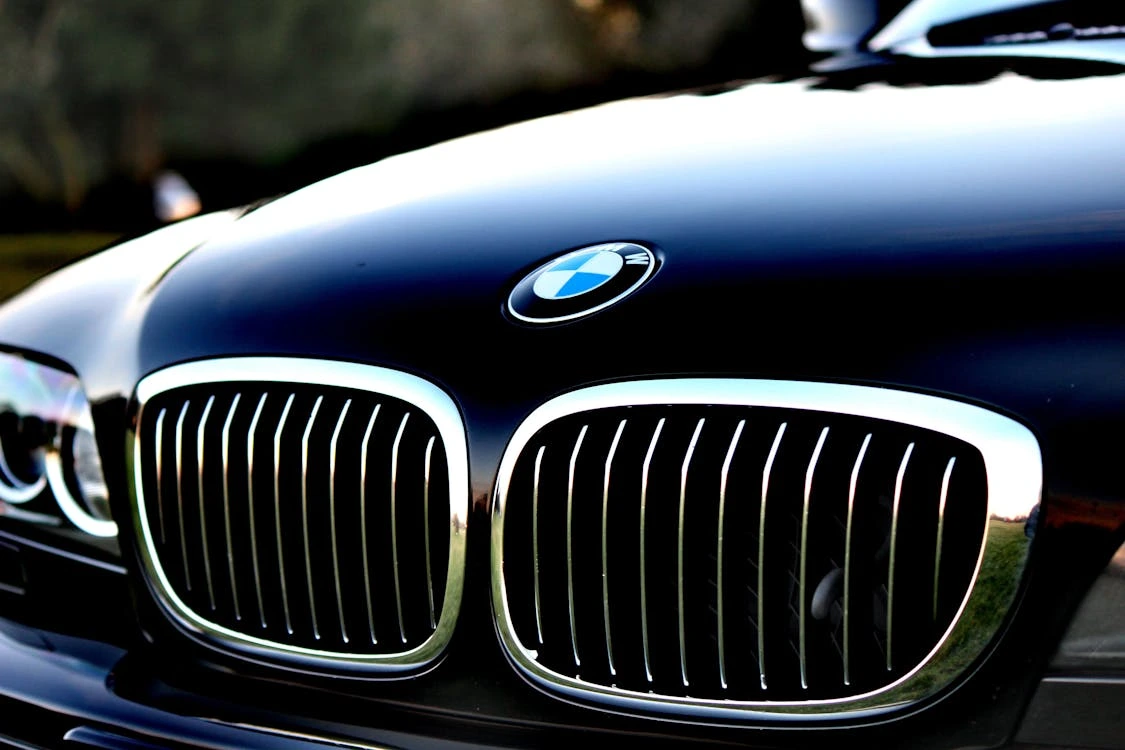 Close-up of a chrome BMW grille on a sleek vehicle