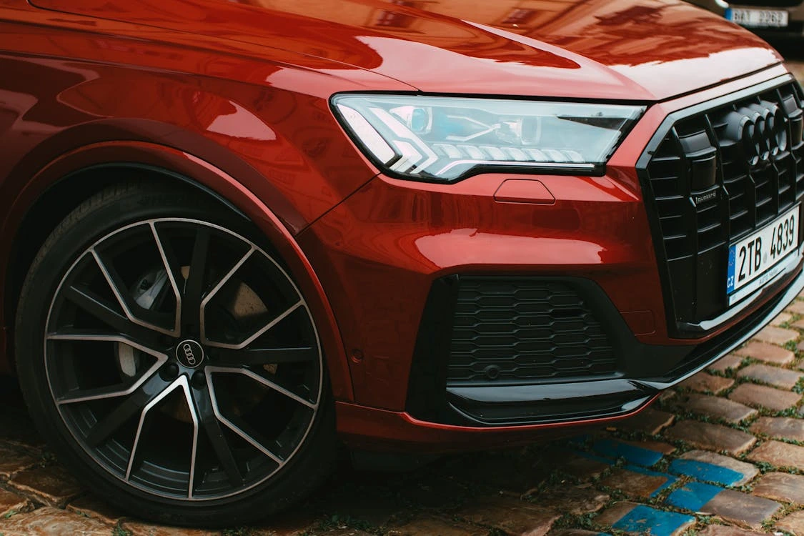 Close-up shot of a red Audi car