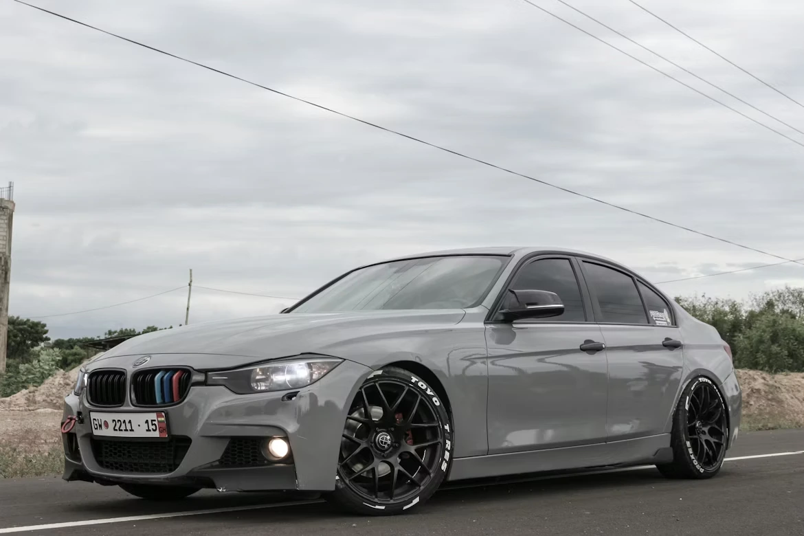 Gray BMW M3 coupe parked outdoors