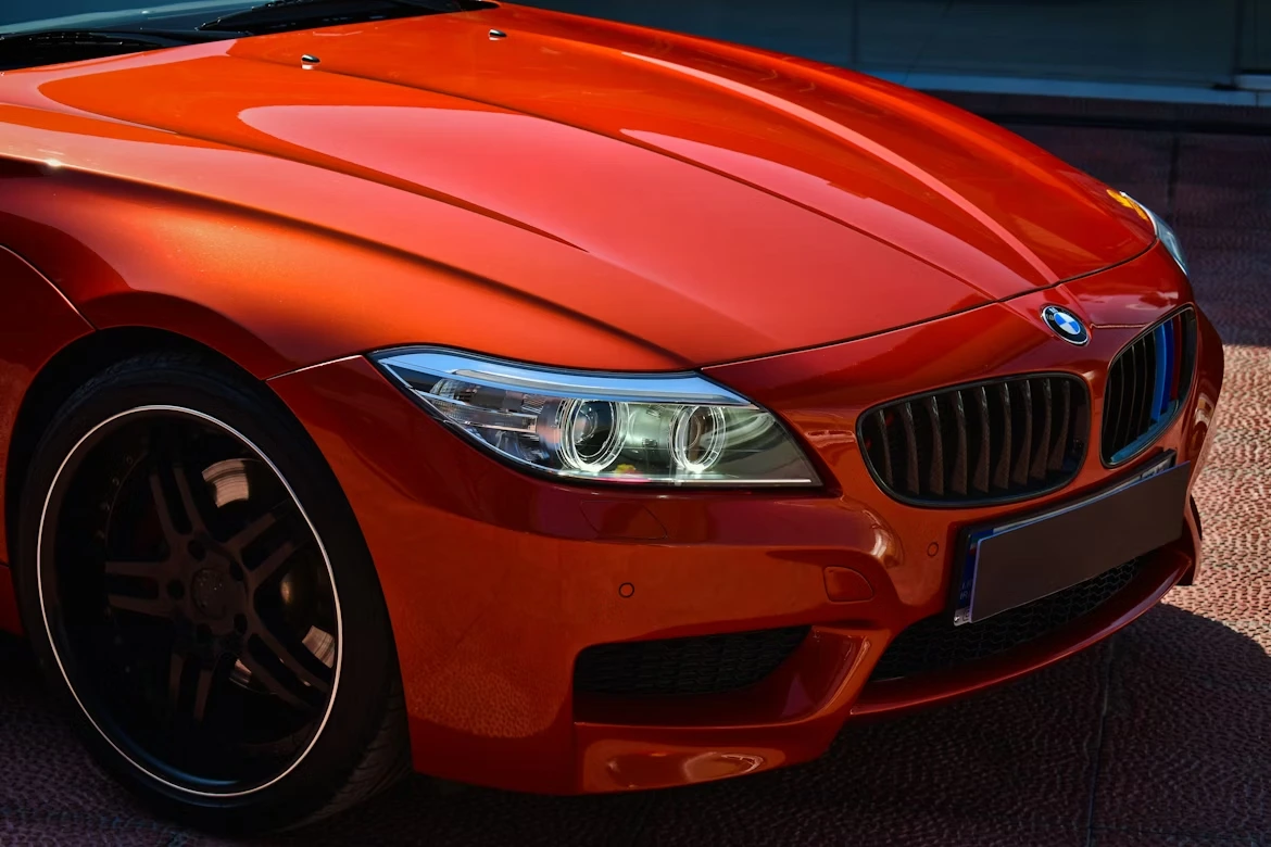 Orange BMW Z4 with black wheel