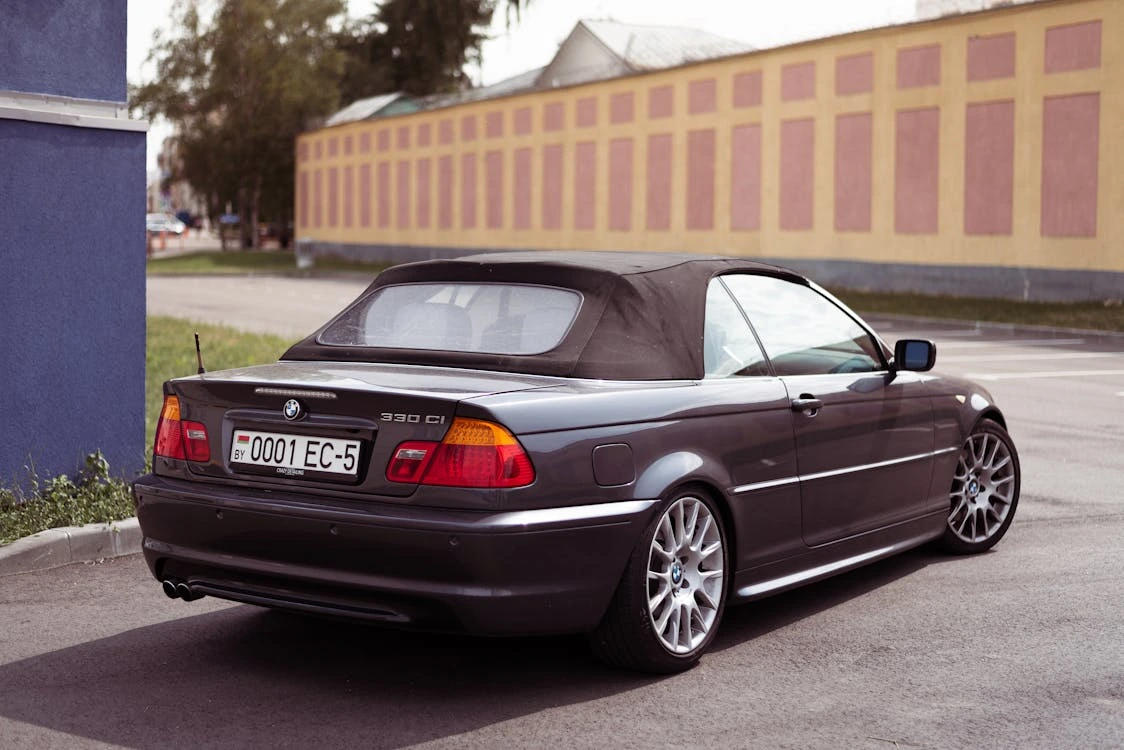 Photograph of a black convertible car