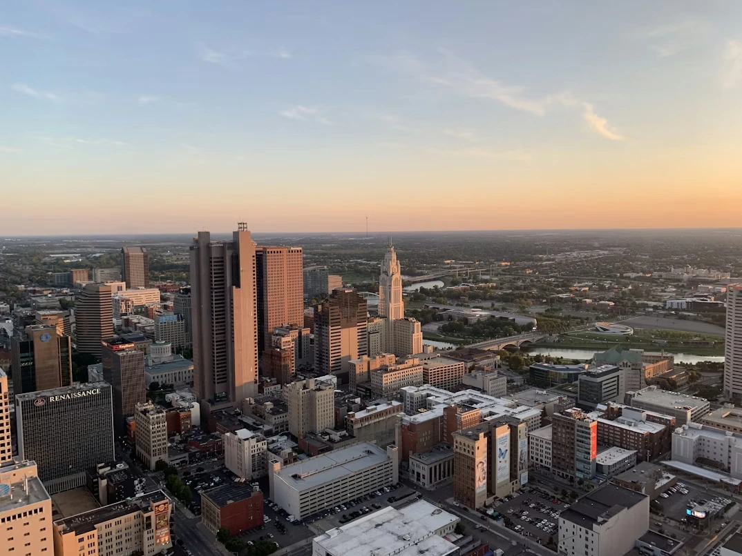 Tall building lot under white clouds and blue sky during daytime in Columbus, Ohio