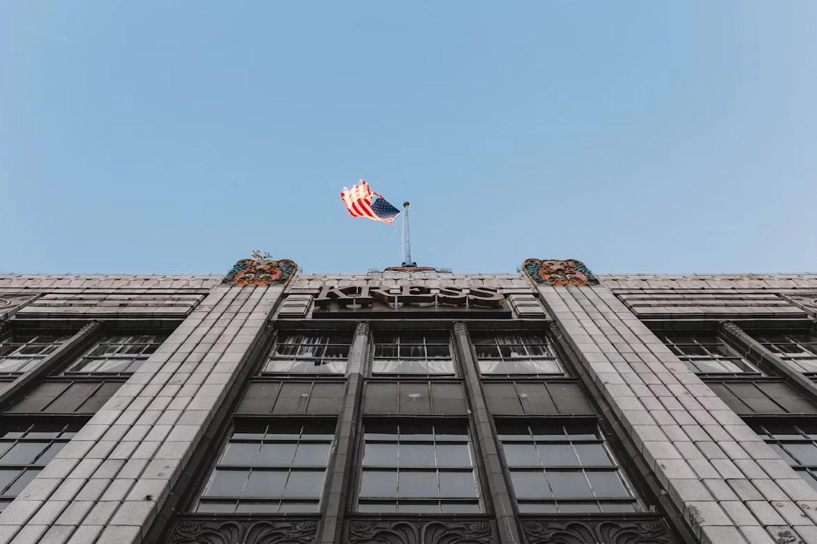 USA flag hanging from a building in Greensboro, North Carolina