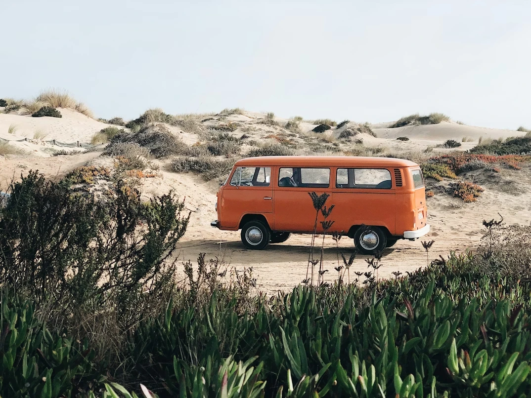 Vintage Volkswagen van parked in the dunes