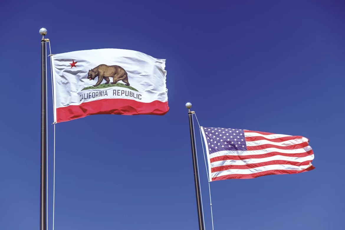 Waving California and U.S. flags