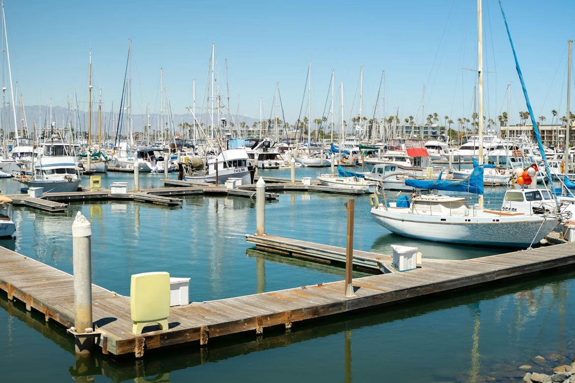 White and blue boats docked at Channel Islands Harbor in Oxnard, California